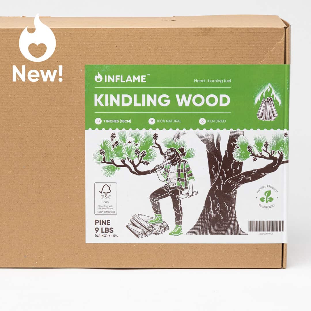 Box of InFlame Kindling Wood with green label, featuring a person stacking wood beside a tree—perfect for cozy holiday gifts.