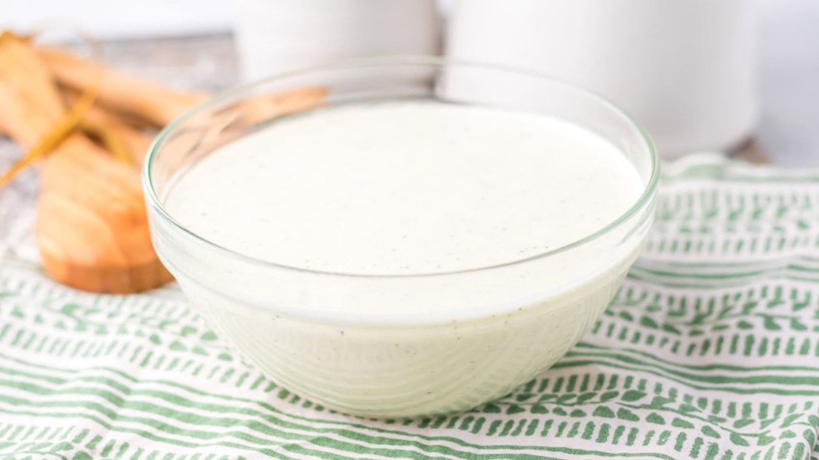 A bowl of salad dressing.