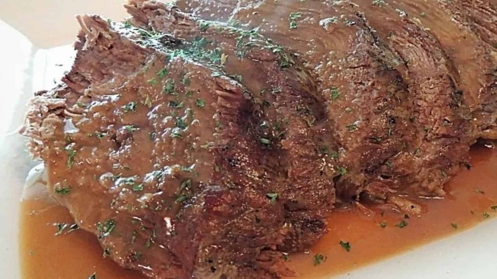 Sunday dinner pot roast plated with vegetables