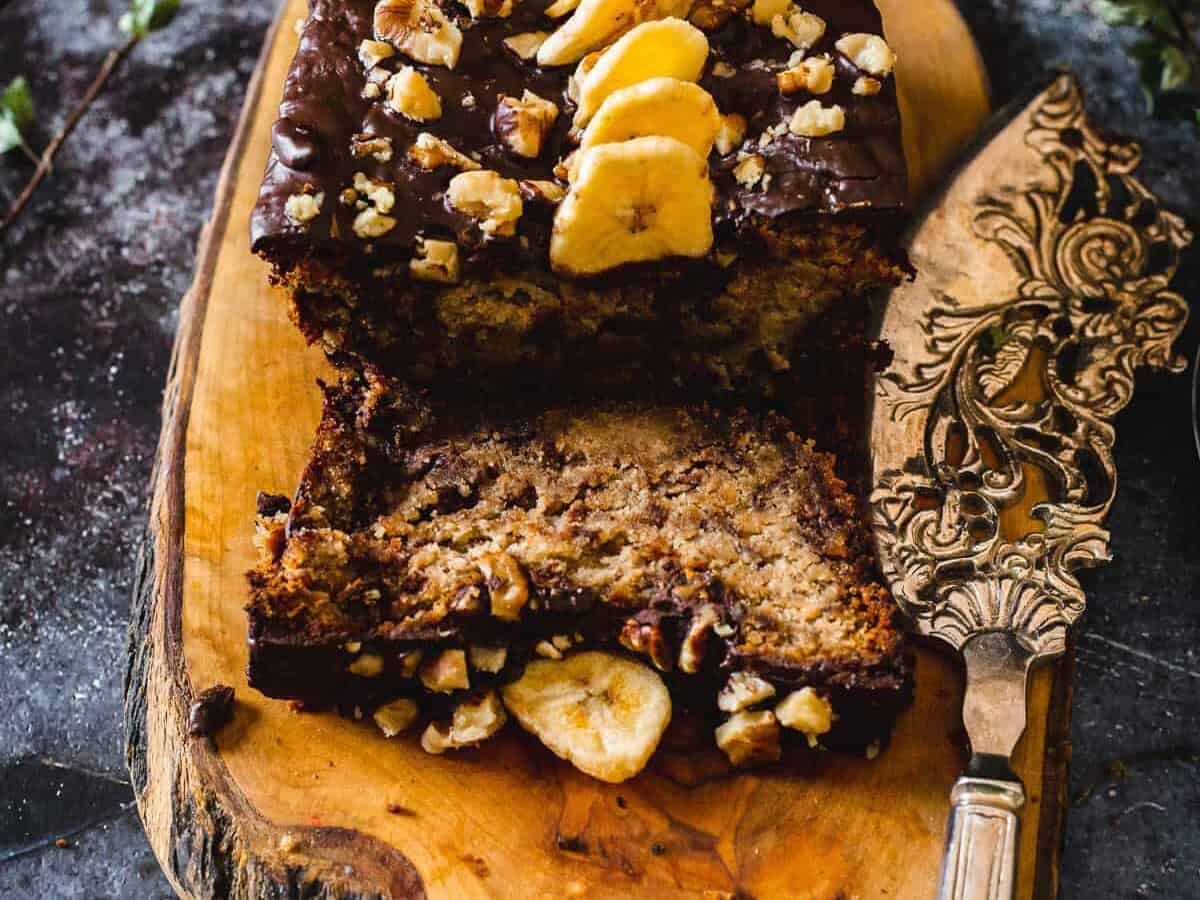a slice cut from chocolate paleo banana bread