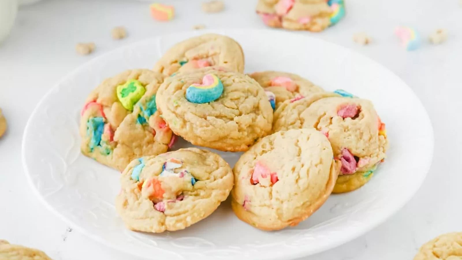 Magical marshmallow cookies with melty centers on a baking sheet.