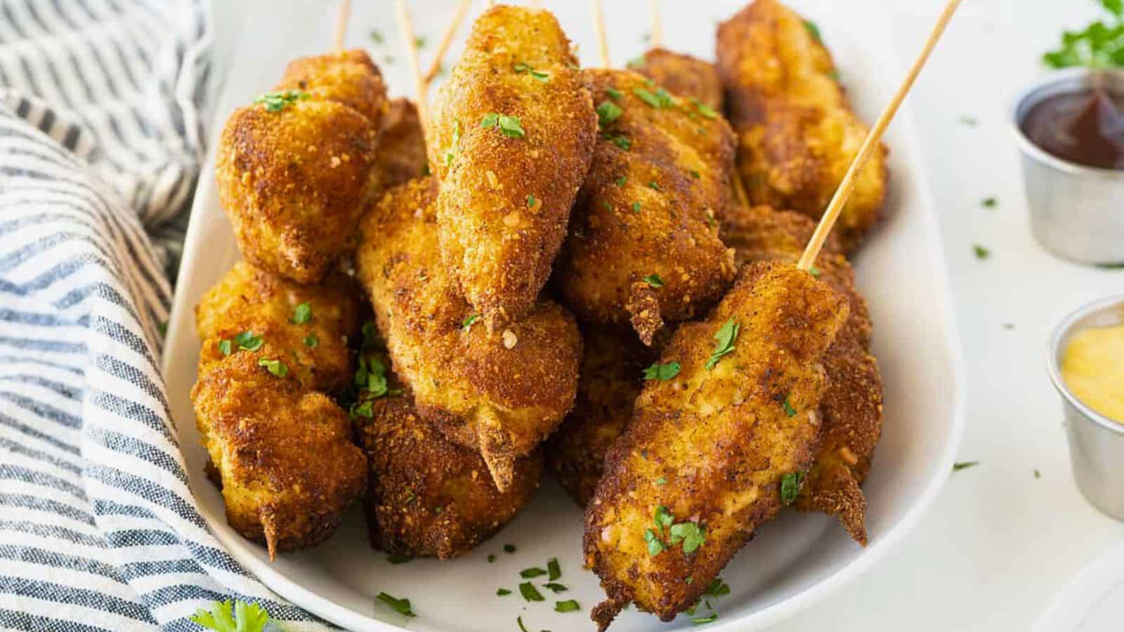 City chicken made with breaded meat skewers cooked until golden brown.