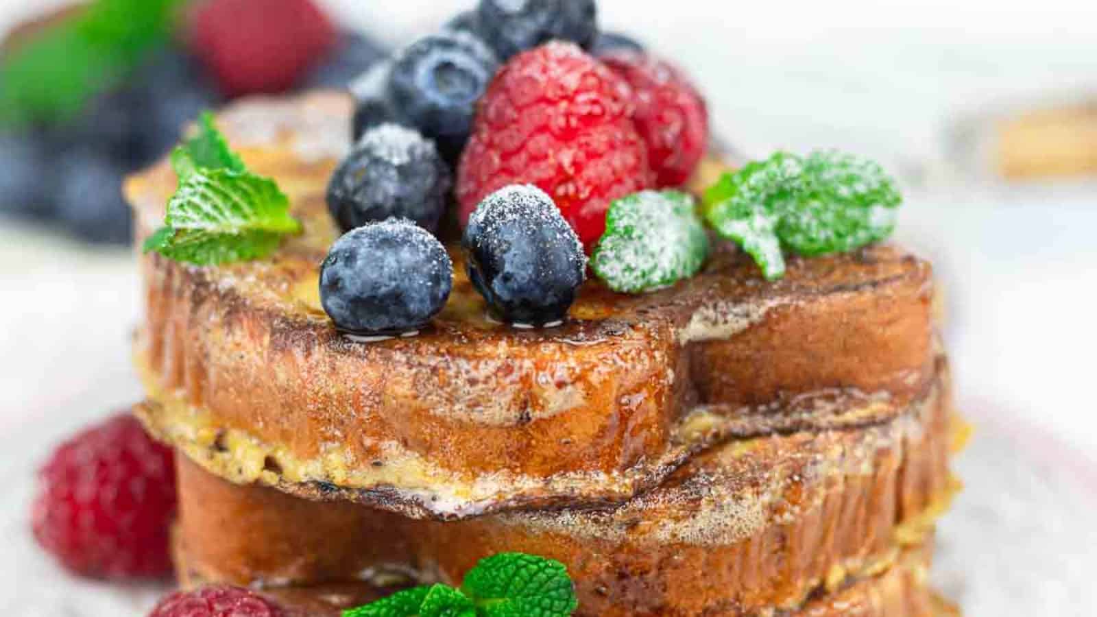 Keto French Toast slices layered on top of each other.