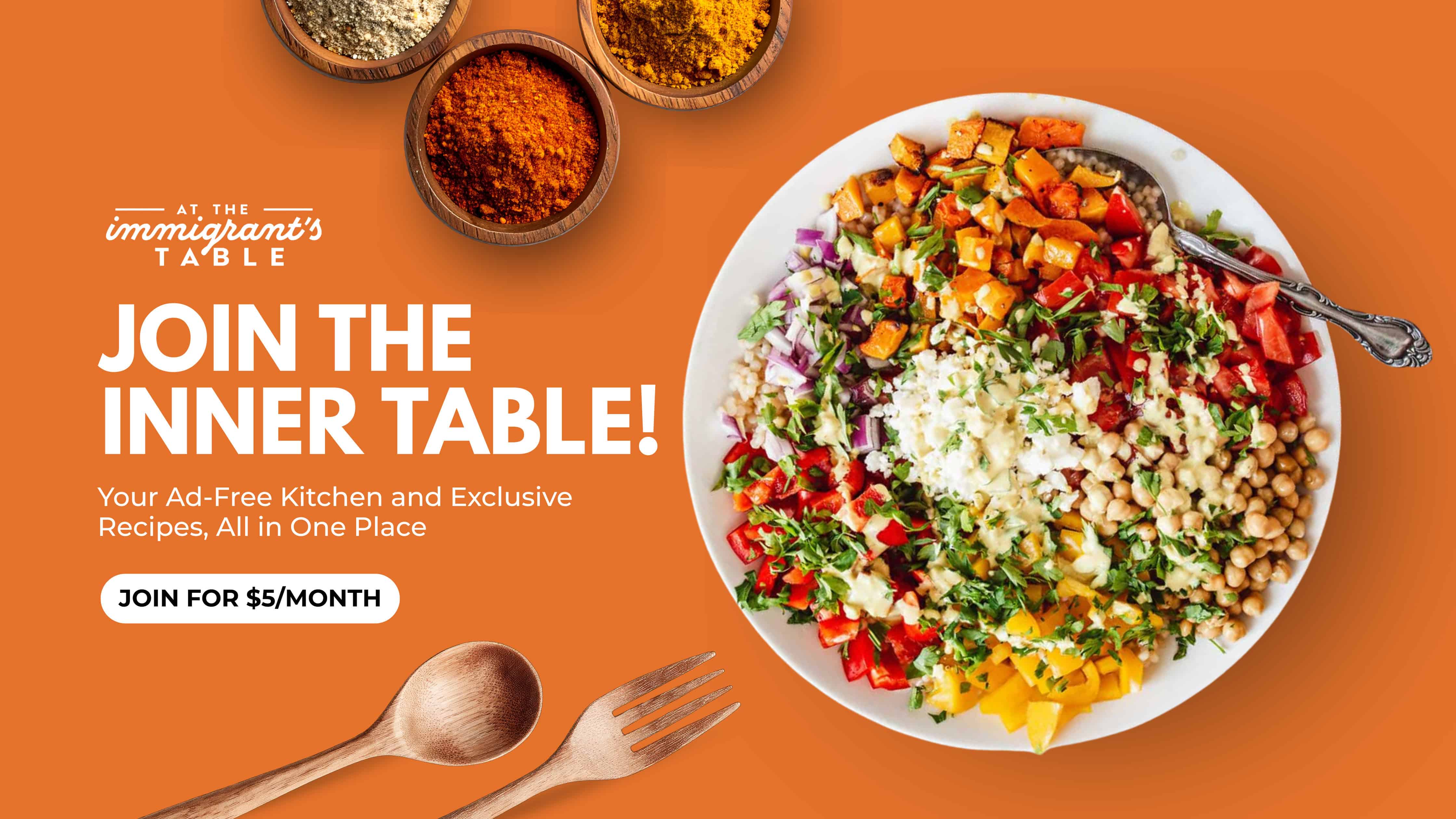A vibrant salad with chopped veggies on a white plate next to text promoting an ad-free kitchen subscription.