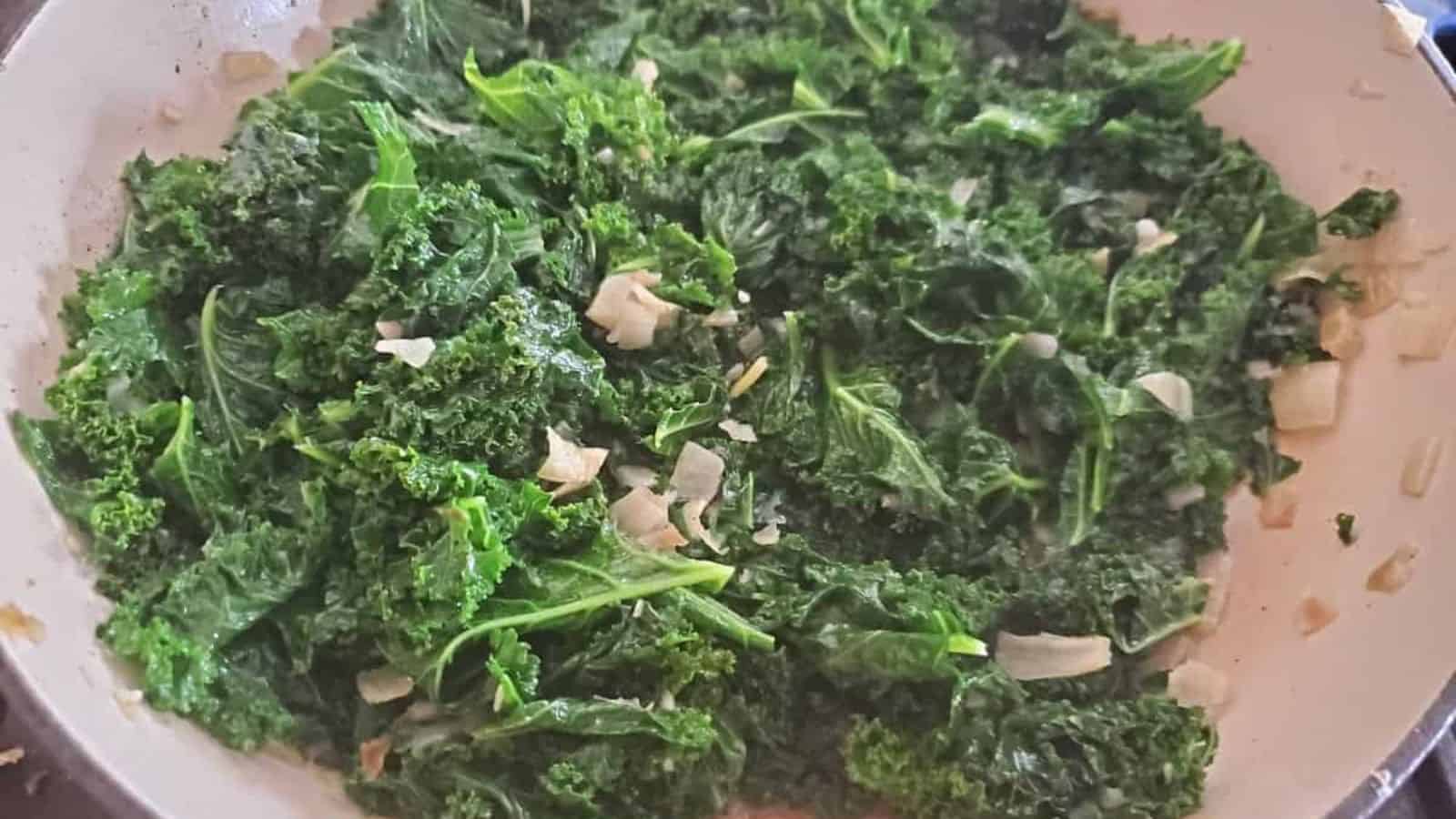 Garlic sesame kale in a pot just cooked and ready to eat.