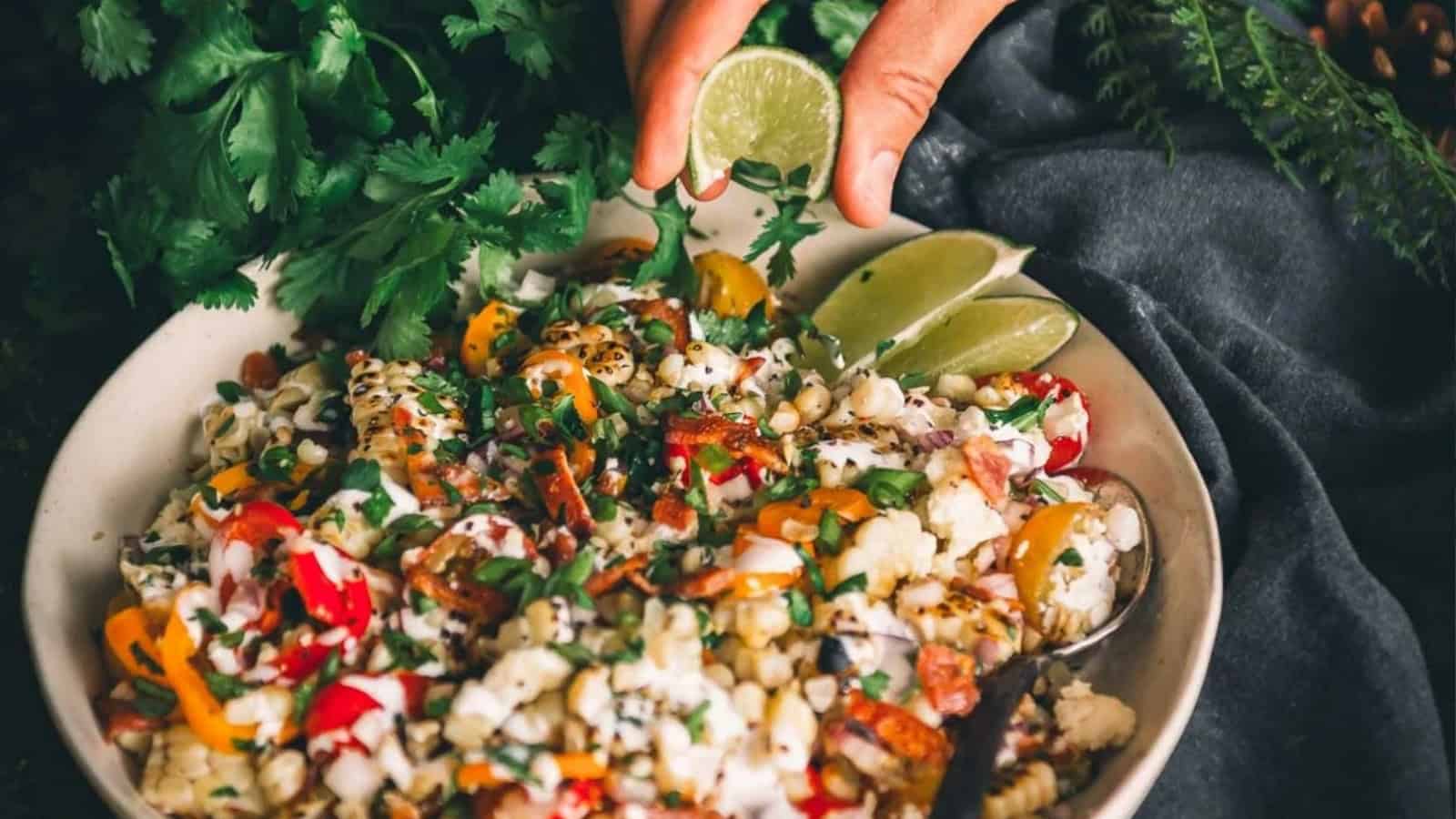 Grilled corn salad with charred kernels tossed with herbs and bright dressing.