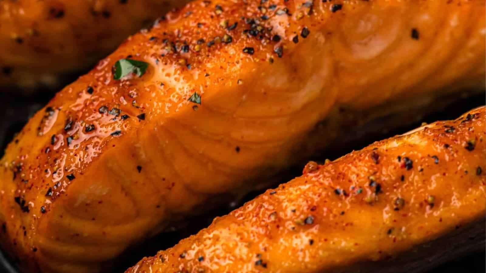 Salmon fillets air fried until flaky with lightly crisp edges.