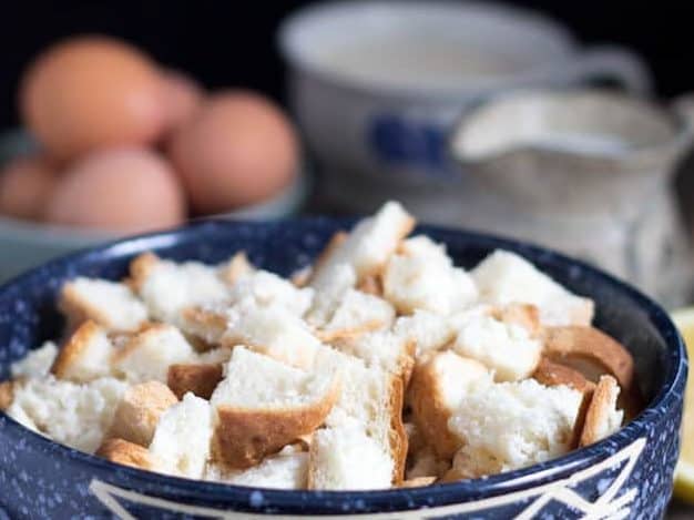 Bread pieces in blue bowl.