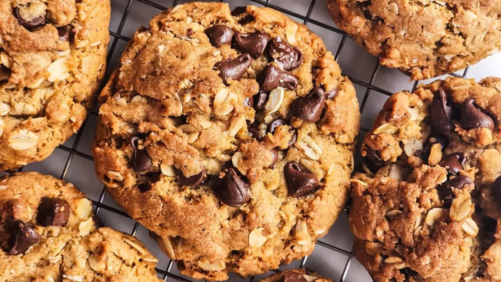 Chocolate oatmeal cookies stacked on a plate.