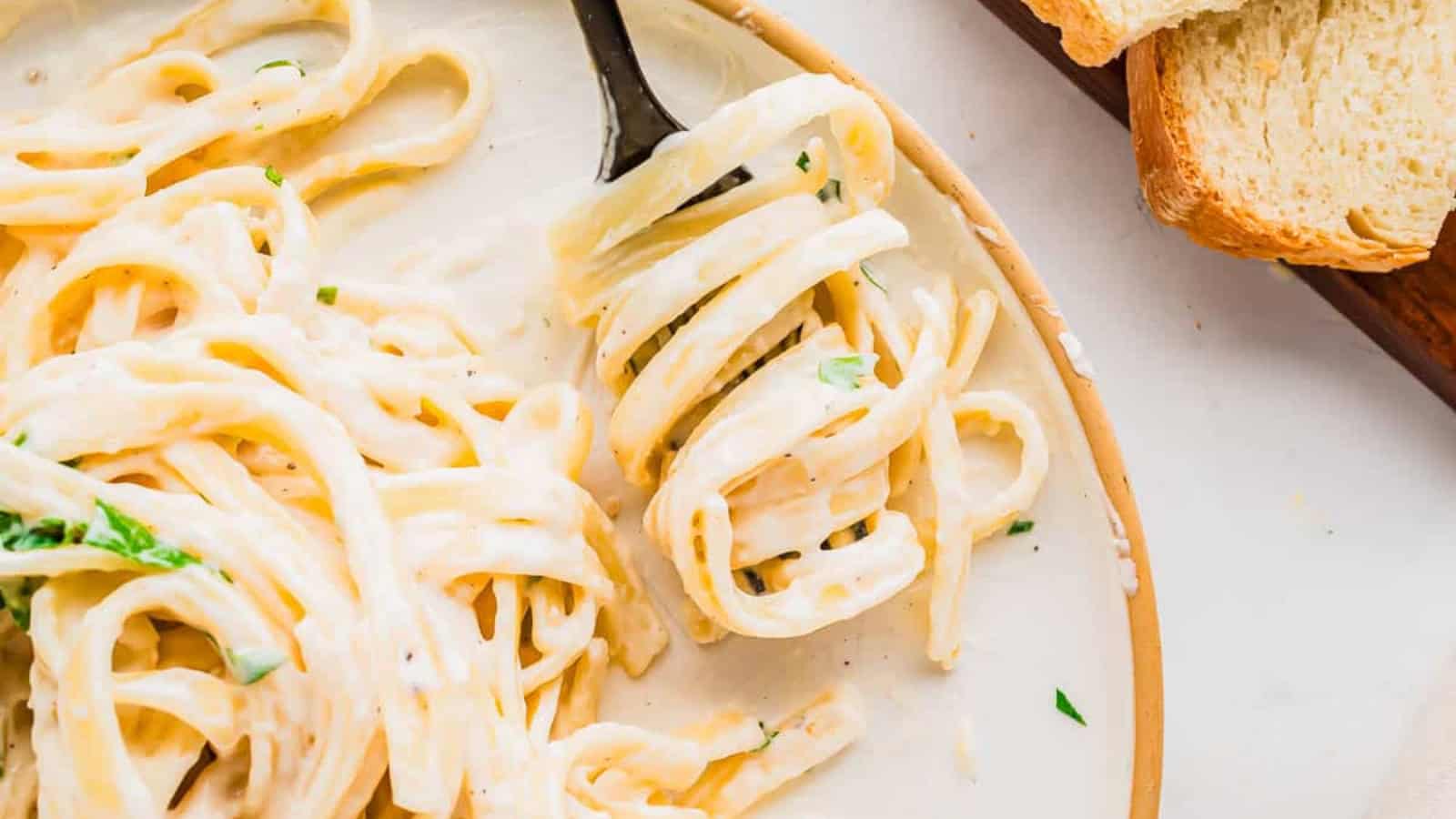 Cottage cheese Alfredo pasta coated in a creamy homemade sauce.