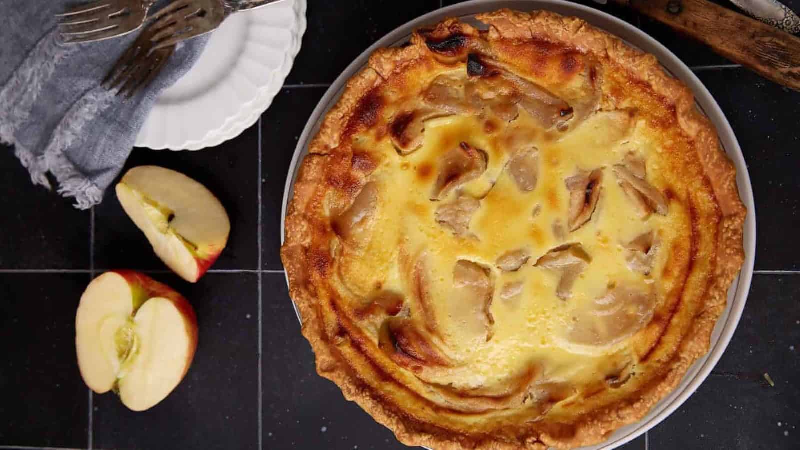 Old-fashioned apple custard pie with tender apples baked in a creamy custard filling.