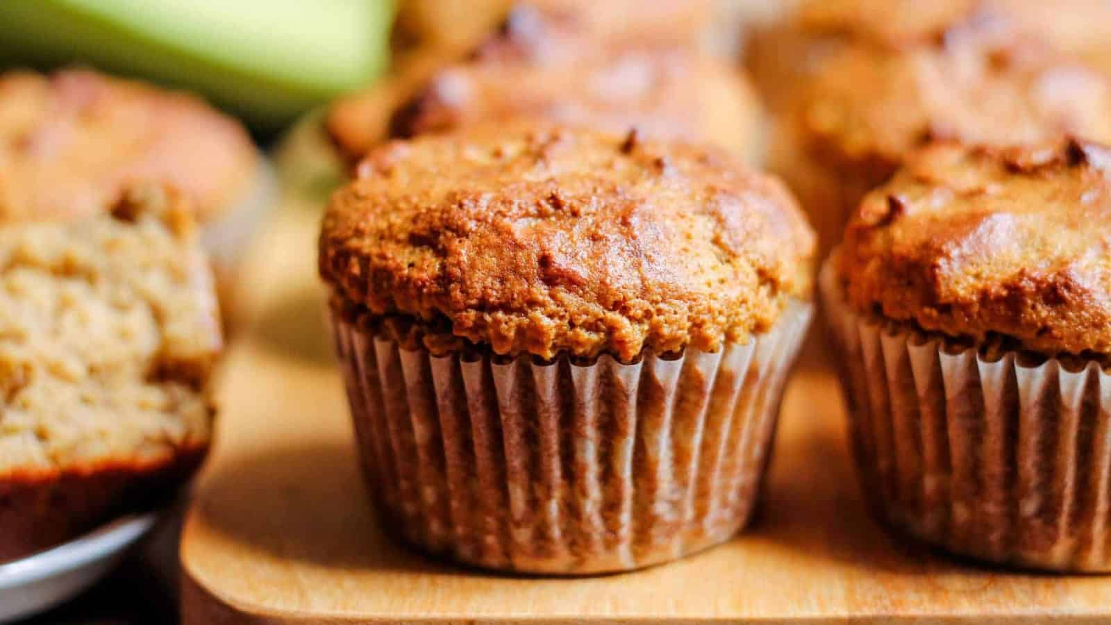 A batch of banana protein muffins on a counter.