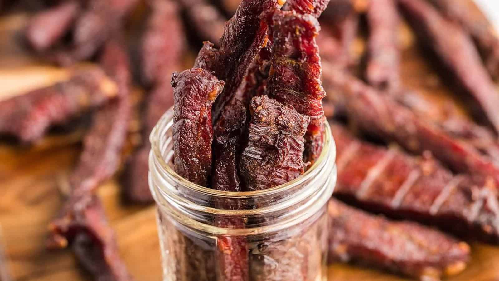 Homemade smoked beef jerky sliced into tender strips.