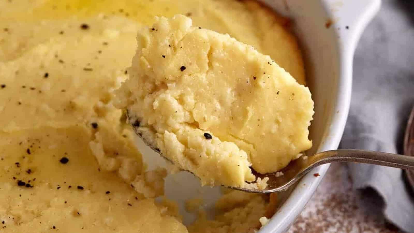 Spoon bread with a golden crust and soft, creamy cornmeal interior.