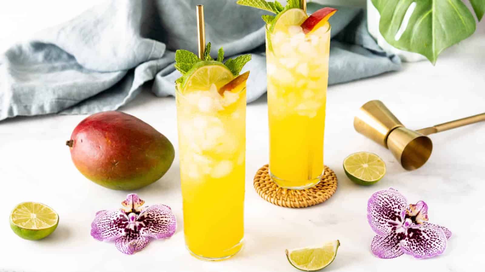 Mango mojito with fresh mango, mint, and lime served over ice.